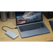 OWC Express 1M2 external SSD drive on a desk attached to macbook pro laptop